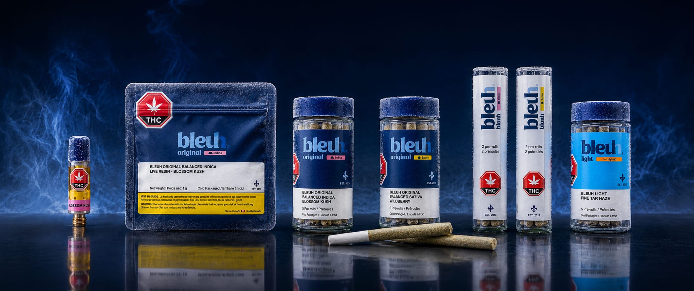 The six new Bleuh products lined up: live resin cartridge, pouch, pre-roll jars and tubes